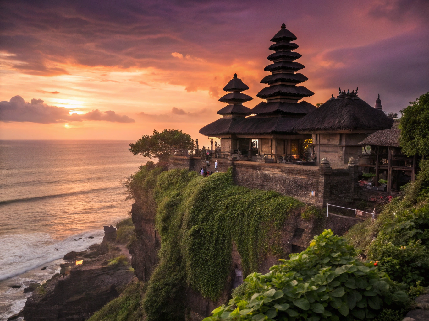 Ancient Balinese temple at sunset overlooking the ocean